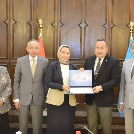 President of Alexandria University, handed over a certificate of honor to the Dean of the Faculty of Pharmacy, Prof. Dr. Mervat Kassem during the University Council meeting in April 2023.